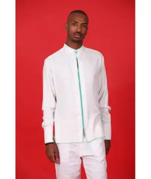 White tunic with green stitching